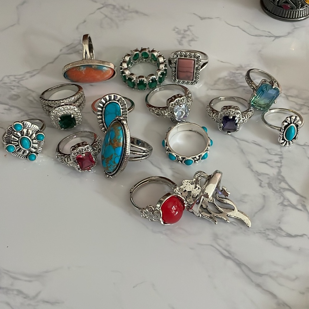 Bags of 16 new rings, various sizes, stones, shapes, and colors